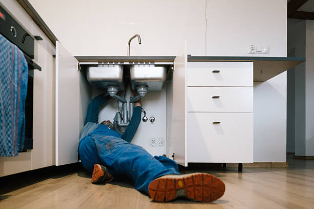 Professional Plumbing technician working in Fort Myers, FL